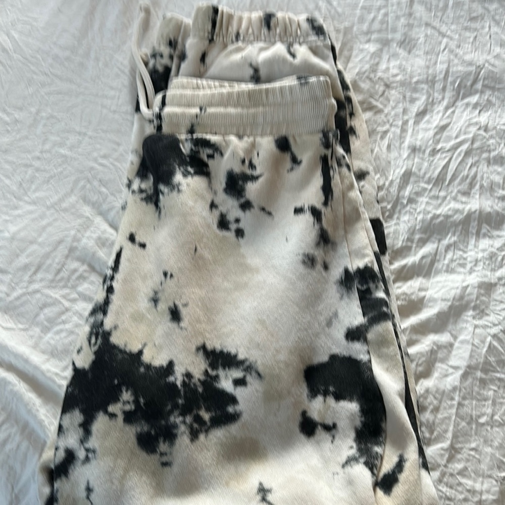 multi color cream and black soft sweats